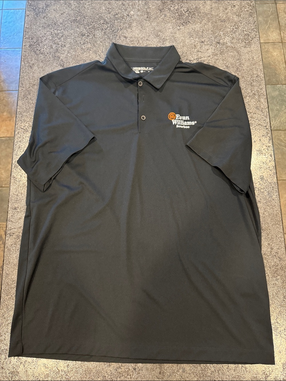 Men’s Black Polo Shirt with Evan Williams Bourbon Logo. Dry-Fit Nike Golf